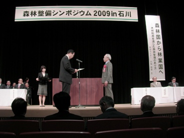 12003